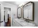 Elegant bathroom with marble countertops, dual sinks, and stylish fixtures at 901 Golfside Dr, Winter Park, FL 32792