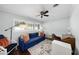 Serene bedroom with lots of natural light, and a ceiling fan at 901 Golfside Dr, Winter Park, FL 32792