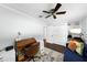 Comfortable home office/bedroom with a ceiling fan, lots of light and generous closet space at 901 Golfside Dr, Winter Park, FL 32792