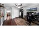 Functional office space with a ceiling fan, ample storage, and ergonomic furniture at 901 Golfside Dr, Winter Park, FL 32792