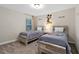 Fun, whimsical bedroom featuring twin beds with unique wood frames and a Mickey Mouse theme at 905 Ocean Course Ave, Davenport, FL 33896