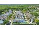 Aerial view of a neighborhood, highlighting the home with a white property line at 931 Croton Rd, Celebration, FL 34747