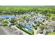 A scenic aerial view of a residential area near a lake, showcasing many homes at 931 Croton Rd, Celebration, FL 34747