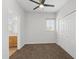 A bedroom with carpeted floors, a window, and a closet at 931 Croton Rd, Celebration, FL 34747