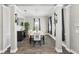 Refined dining room boasts sophisticated decor, sleek floors, and an inviting atmosphere for meals at 931 Croton Rd, Celebration, FL 34747