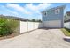 Spacious garage with a long driveway and fenced backyard, offering ample parking and privacy at 931 Croton Rd, Celebration, FL 34747