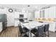 Bright kitchen showcasing an island with seating, stainless steel appliances, and ample cabinet space at 931 Croton Rd, Celebration, FL 34747