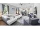 Open-concept living room connecting to kitchen, offering ample space, seating, and natural light at 931 Croton Rd, Celebration, FL 34747