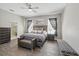 Inviting main bedroom with a ceiling fan, soft lighting, and a comfortable bed at 931 Croton Rd, Celebration, FL 34747
