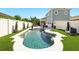 Inviting pool area with sparkling water, elegant landscaping, and a serene outdoor atmosphere at 931 Croton Rd, Celebration, FL 34747