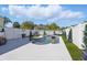 Sparkling pool with stylish fire features and lush artificial turf, ideal for outdoor entertaining at 931 Croton Rd, Celebration, FL 34747