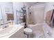 Cozy bathroom featuring a tub with shower, vanity with sink, and modern fixtures at 1060 Elkcam Blvd, Deltona, FL 32725