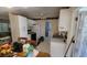 Bright kitchen with white cabinets and appliances at 1118 Arrowsmith Ave, Orlando, FL 32809