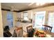 Cozy eat-in kitchen with white cabinets at 1118 Arrowsmith Ave, Orlando, FL 32809