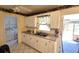Functional kitchen with white cabinets and stainless sink at 1118 Arrowsmith Ave, Orlando, FL 32809