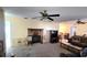 Cozy living room featuring a brick fireplace at 1118 Arrowsmith Ave, Orlando, FL 32809