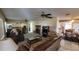 Spacious living room with a brick fireplace and neutral decor at 1118 Arrowsmith Ave, Orlando, FL 32809