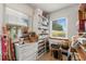 Bright home office with large windows, built-in shelving, and ample natural light at 11200 Lane Park Rd, Tavares, FL 32778