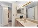 Functional bathroom featuring a vanity with double mirrors and a convenient layout at 1162 Carmel Cir # 440, Casselberry, FL 32707
