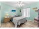 Calming bedroom with light walls and a ceiling fan for comfortable relaxation at 1162 Carmel Cir # 440, Casselberry, FL 32707
