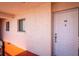Inviting entrance with door and side window providing natural light at 1162 Carmel Cir # 440, Casselberry, FL 32707