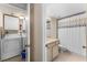 Convenient laundry area adjacent to the bathroom, streamlining household tasks at 1162 Carmel Cir # 440, Casselberry, FL 32707