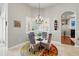 Cozy dining area with natural light and view of the backyard at 12614 Hawkstone Dr, Windermere, FL 34786