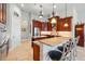 Gourmet kitchen with granite countertops, stainless steel appliances, and custom cabinetry at 12614 Hawkstone Dr, Windermere, FL 34786