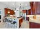 Beautiful kitchen with an island, barstool seating, and stainless steel appliances at 12614 Hawkstone Dr, Windermere, FL 34786