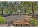 Community playground with swings, slides, and benches, creating a fun and safe environment for children at 12614 Hawkstone Dr, Windermere, FL 34786