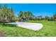 Community volleyball court on a sandy surface, perfect for a fun game in the sun at 12614 Hawkstone Dr, Windermere, FL 34786