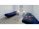 Comfortable bedroom featuring two twin beds with cartoon covers at 130 Palermo St, Davenport, FL 33897