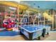 Indoor play area featuring games, a climbing structure, and fun activities for  at 130 Palermo St, Davenport, FL 33897