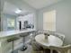 Well-lit kitchen with breakfast bar and dining area at 130 Palermo St, Davenport, FL 33897