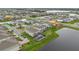 Aerial view of lakeside homes, showcasing the community layout and scenic water views at 13640 Haulover Beach Ln, Orlando, FL 32827