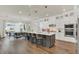 Bright and open kitchen with a large island, white cabinetry, and stainless steel appliances at 13640 Haulover Beach Ln, Orlando, FL 32827
