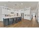 Bright, open kitchen featuring an island with bar stool seating, and ample counter space at 13640 Haulover Beach Ln, Orlando, FL 32827