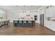 Spacious kitchen with a central island, stainless steel appliances, and hardwood floors at 13640 Haulover Beach Ln, Orlando, FL 32827