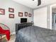 Bedroom featuring grey walls, ceiling fan, white closet doors, and modern dark furniture at 1438 Brookdale Ct, Oviedo, FL 32765