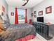 Stylish bedroom featuring a dark color palette, decorative accents and comfortable furnishing at 1438 Brookdale Ct, Oviedo, FL 32765