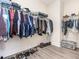 Organized walk-in closet providing ample storage with racks, shelves, and floor space at 1438 Brookdale Ct, Oviedo, FL 32765