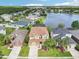 Aerial view of the home, showcasing its proximity to the lake at 14819 Braywood Trl, Orlando, FL 32824