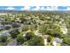 Beautiful aerial view of the neighborhood with lush greenery and community lake at 1511 Crestline St, Orlando, FL 32806