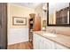 Charming bathroom with warm colors, classic vanity, and stylish accents at 1511 Crestline St, Orlando, FL 32806