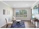 Inviting living room with ample natural light, seating, and stylish decor at 1561 Corkery Ct, Winter Springs, FL 32708