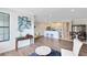 Open concept living area showcasing the kitchen, bar seating, and access to the dining area at 1561 Corkery Ct, Winter Springs, FL 32708