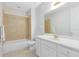 Bright bathroom featuring a single sink vanity, tiled shower and tub combination, and white trim at 1565 Corkery Ct, Winter Springs, FL 32708