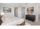 Brightly lit, spacious bedroom with closet and ensuite entrances, plus neutral carpet and white trim at 1565 Corkery Ct, Winter Springs, FL 32708