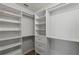 Spacious walk-in closet with custom shelving provides ample storage and organization options at 1613 Sapphire Star Dr, Oviedo, FL 32765