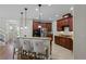 Spacious kitchen with an island, breakfast bar, and stainless steel appliances at 1613 Sapphire Star Dr, Oviedo, FL 32765